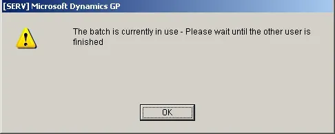 Error message presented to the user stating "The batch is currently in use - Please wait until the other user is finished" with an OK button as the only option to select.